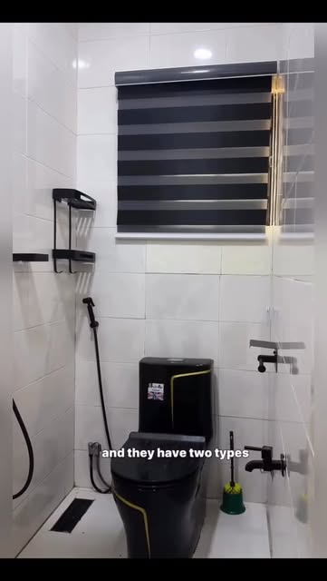Clean tiled guest bathroom at Smart Luxury Apartments